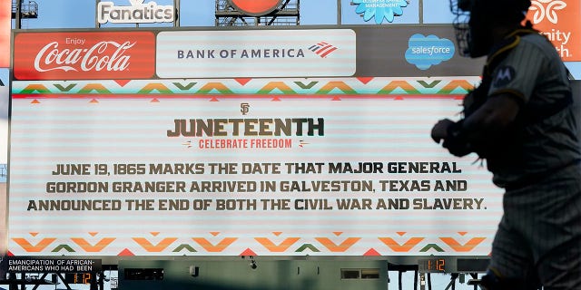 Message about Juneteenth displayed on scoreboard