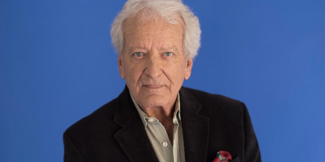 Nicolas Coster poses for a portrait