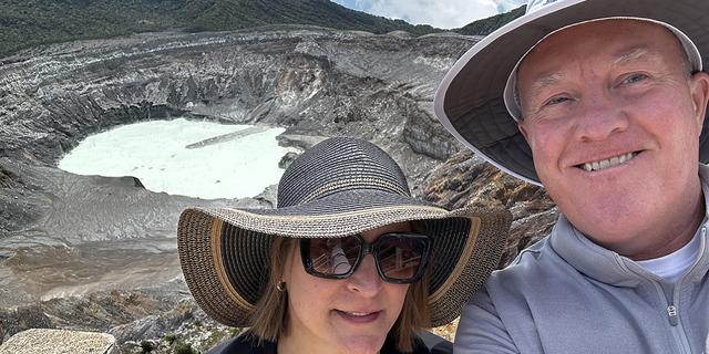 Deanne Niedziela and Ken Niedziela pose for photo in Costa Rica