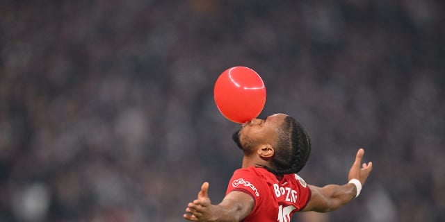 Christopher Nkunku celebrates the goal