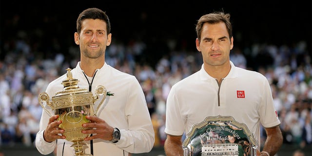 Novak Djokovic and Roger Federer pose