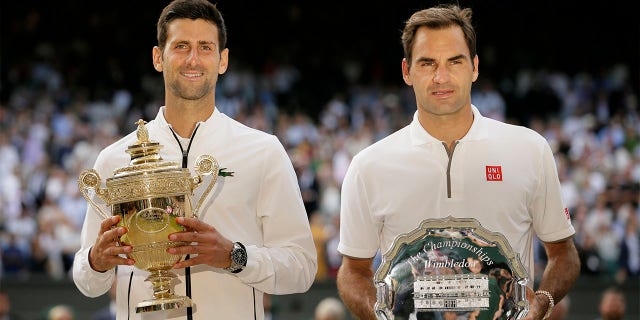 Novak Djokovic and Roger Federer pose