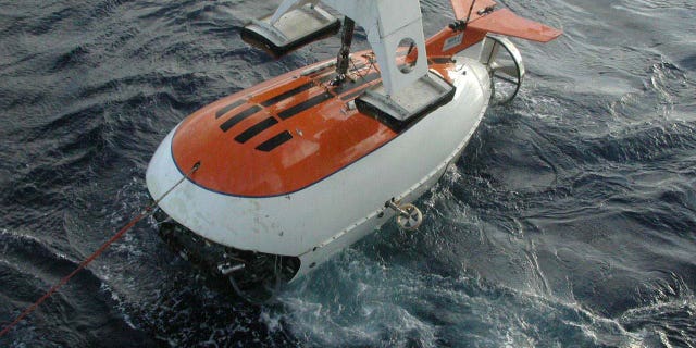 A Mir submersible is lowered into the water