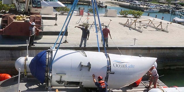 Titan submersible being transferred onto a platform