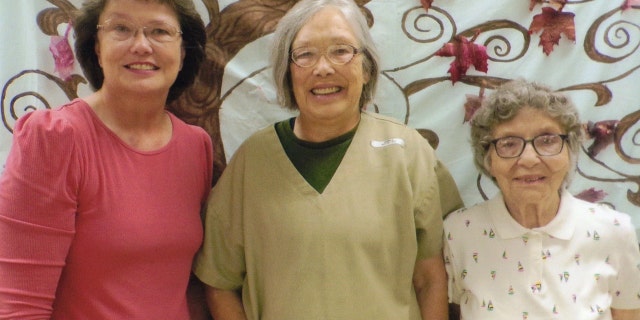 Sandra Hemme (center) pictured with her sister (right) and mother (left)