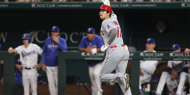 Shohei Ohtani reacts after hitting home run