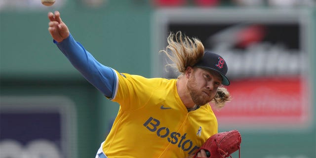 Kaleb Ort throws pitch