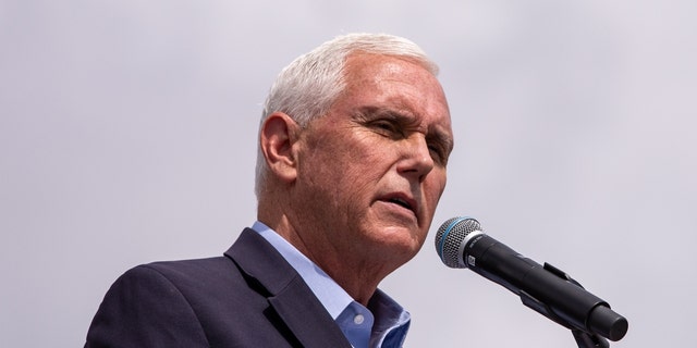Mike Pence at a microphone
