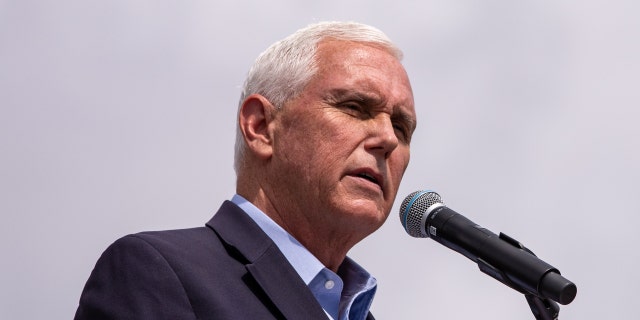 Mike Pence at a microphone