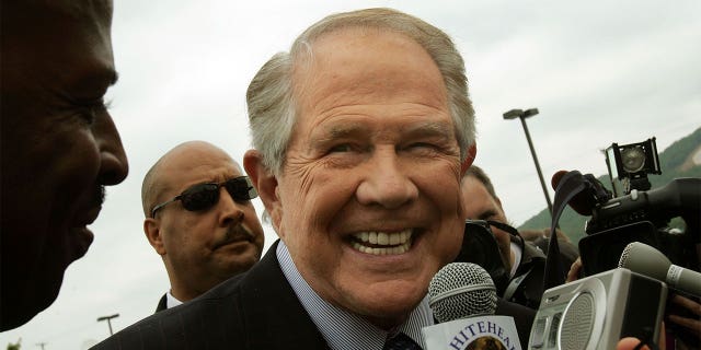 Pat Robertson smiling at the camera.