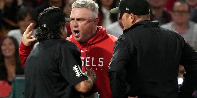 Phil Nevin argues with Phil Cuzzi