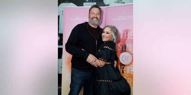 Ricki Lake hugging husband Ross Burningham