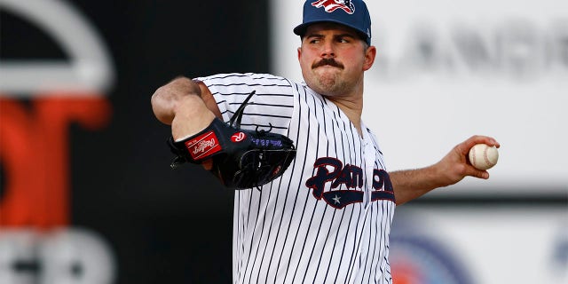 Carlos Rodon throws pitch