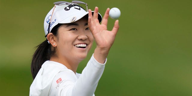 Rose Zhang smiles on driving range