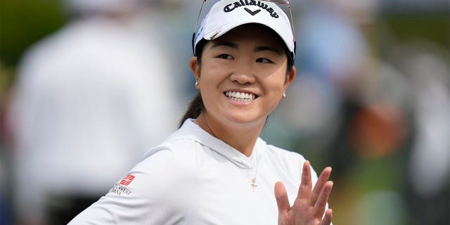 Rose Zhang waves on the driving range