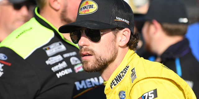 Ryan Blaney looks on