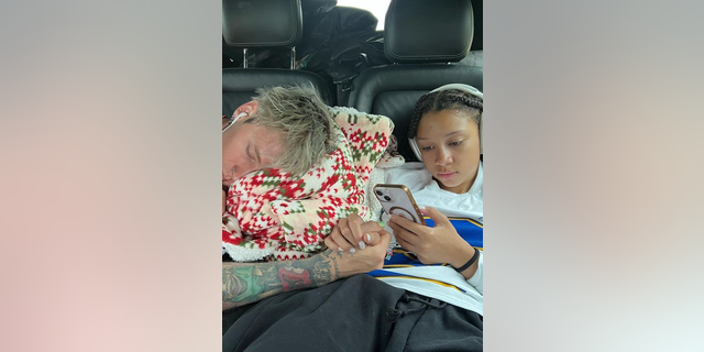 Machine Gun Kelly and Casie in car