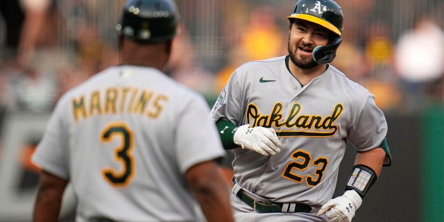 Shea Langeliers celebrates after hitting a home run