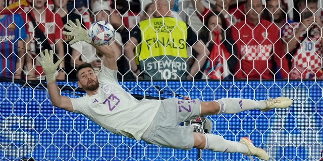 Unai Simon stops penalty shot
