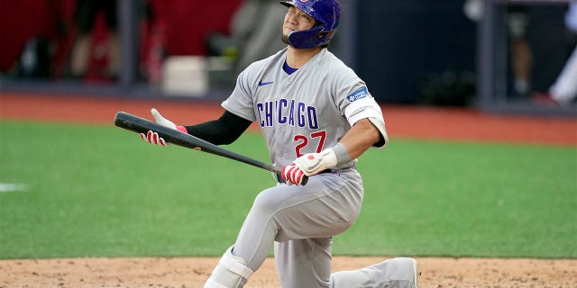 Seiya Suzuki reacts after missed swing