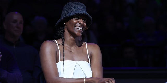 Sylvia Fowles smiles during the jersey retirement ceremony