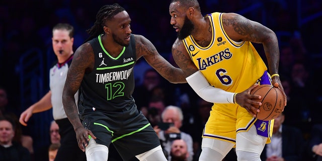 Taurean Prince guards LeBron James