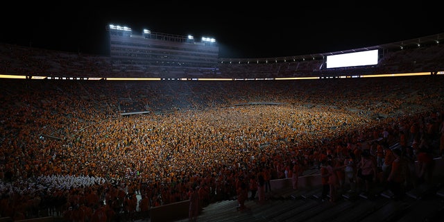 Tennessee Volunteers fans rush the field