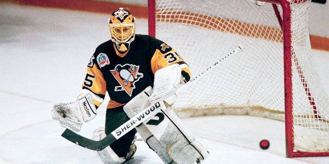Tom Barrasso saves shot