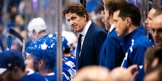 Mike Babcock looks on during a game