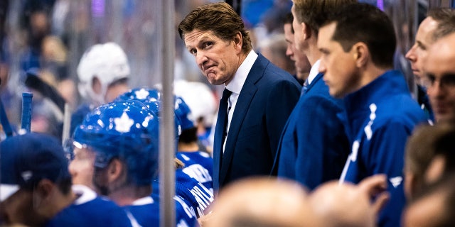 Mike Babcock looks on during a game