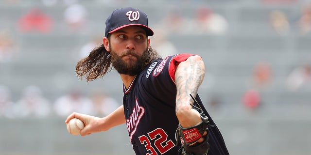 Trevor Williams pitches