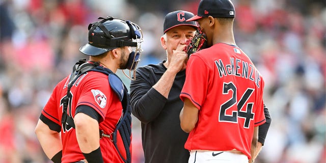 Carl Willis talks with Triston McKenzie and Mike Zunino