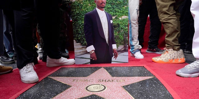 Tupac's picture and star on Hollywood Walk of Fame