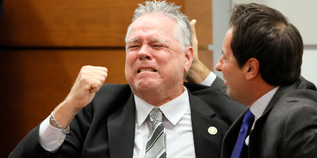 Scot Peterson celebrates after acquittal