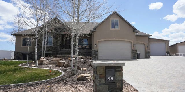 Home of woman accused of killing husband