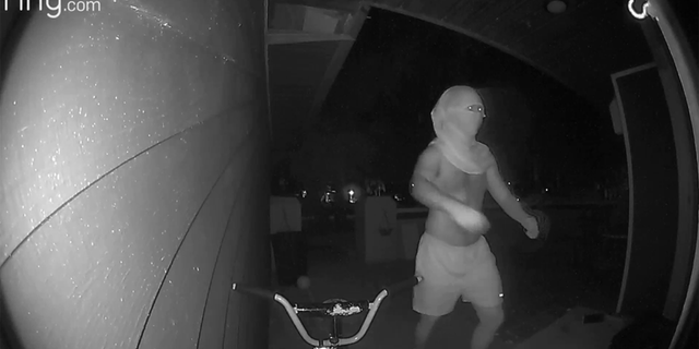 A shirtless person on a Ring doorcam
