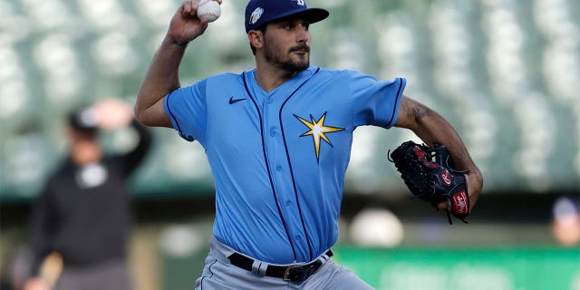 Zach Eflin throws a pitch