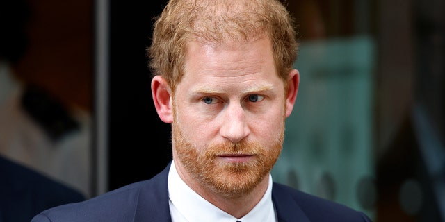 A close-up of Prince Harry looking stern