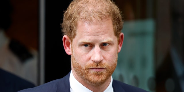 A close-up of Prince Harry looking stern