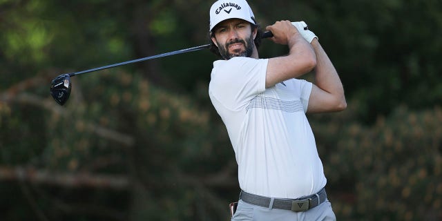 Adam Hadwin swinging club