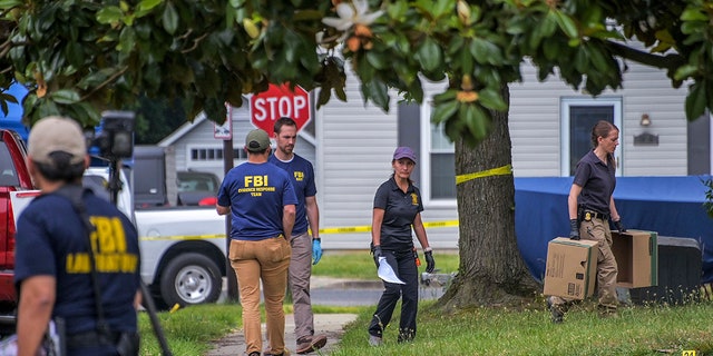 FBI on scene during daytime