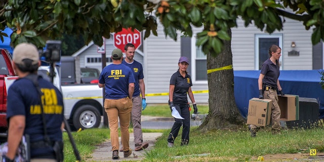 FBI on scene during daytime