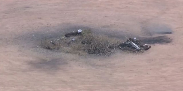 bonfire pile in desert