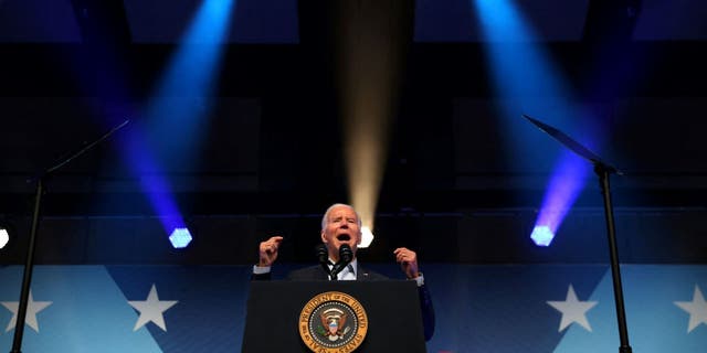 Biden speaking at podium