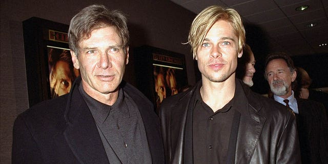 Harrison Ford and Brad Pitt wear matching black blazers to film premiere