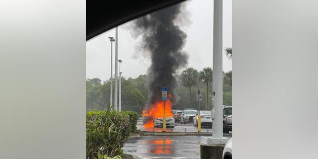 Shoplifting car in flames