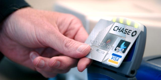 Chase Bank credit card with "blink" technology is displayed during a press conference at an Arby's restaurant on June 8, 2005 in Denver, Colo.