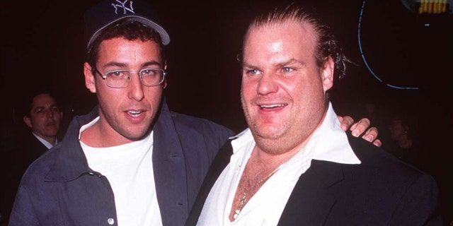 Adam Sandler wraps his arm around Chris Farley