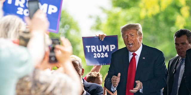 Former President Donald Trump campaigns in Iowa