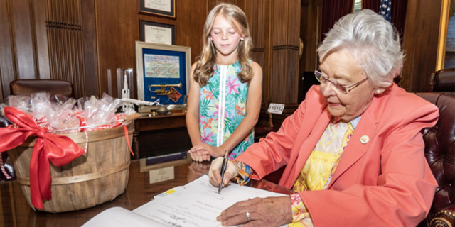 Alabama governor Kay Ivey signs "cookie bill" into law
